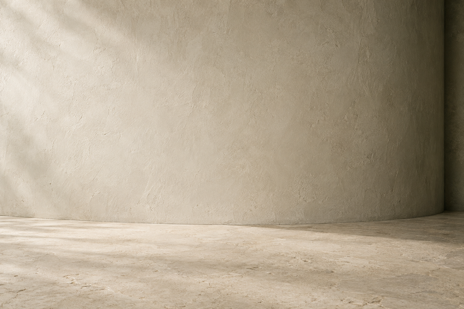 Softly lit limestone and olive plaster